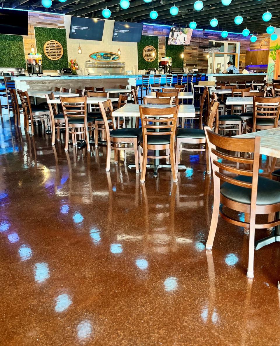 The ultra-shiny copper floor reflects light at Hooked Island Grill in Cape Coral.
