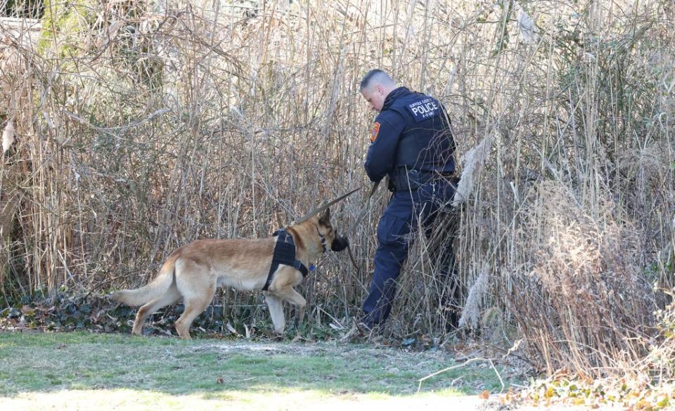 Police on the scene of the gruesome discovery. Dennis A. Clark