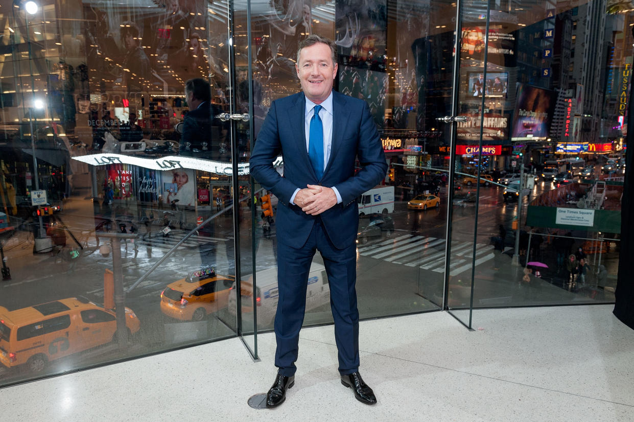 NEW YORK, NY - DECEMBER 09:  Piers Morgan visits 'Extra' at their New York studios at H&M in Times Square on December 9, 2014 in New York City.  (Photo by D Dipasupil/Getty Images for Extra)