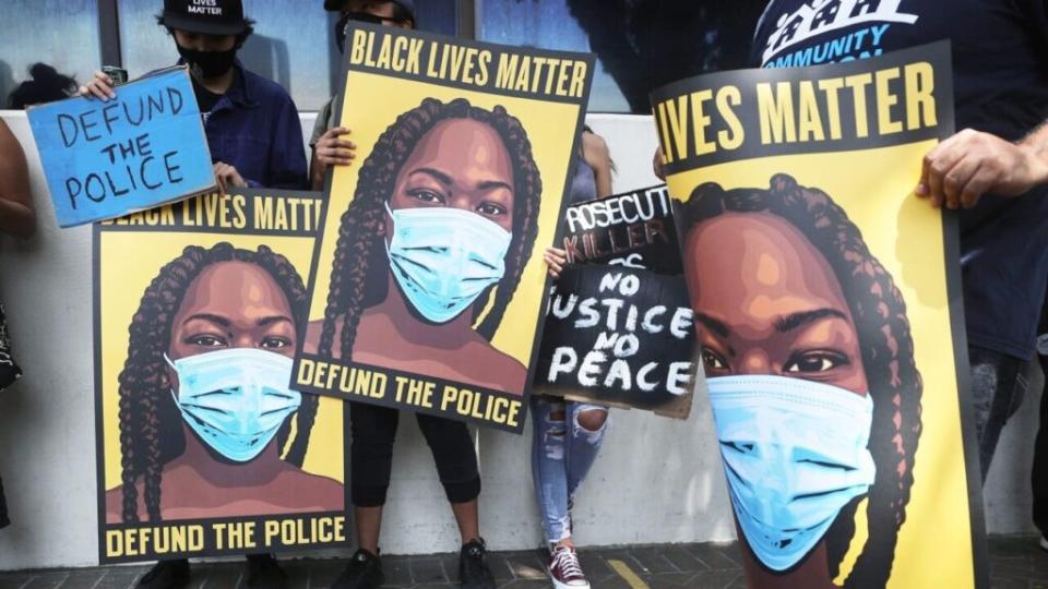 Black Lives Matter-Los Angeles supporters protest outside the Unified School District headquarters calling on the board of education to defund school police on June 23, 2020 in Los Angeles, California. (Photo by Mario Tama/Getty Images)