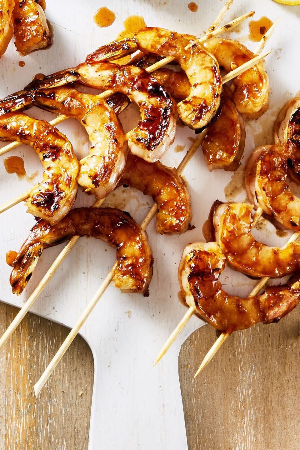 <p>If you're serving some savory barbecue later on, these sweet-and-savory shrimp kebabs will get every in the mood for more grilled goodness.</p><p><em><a href="https://www.goodhousekeeping.com/food-recipes/a44099/chili-honey-garlic-shrimp-kebabs-recipe/" rel="nofollow noopener" target="_blank" data-ylk="slk:Get the recipe for Chili-Honey-Garlic Shrimp Kebabs »;elm:context_link;itc:0;sec:content-canvas" class="link ">Get the recipe for Chili-Honey-Garlic Shrimp Kebabs »</a></em></p>