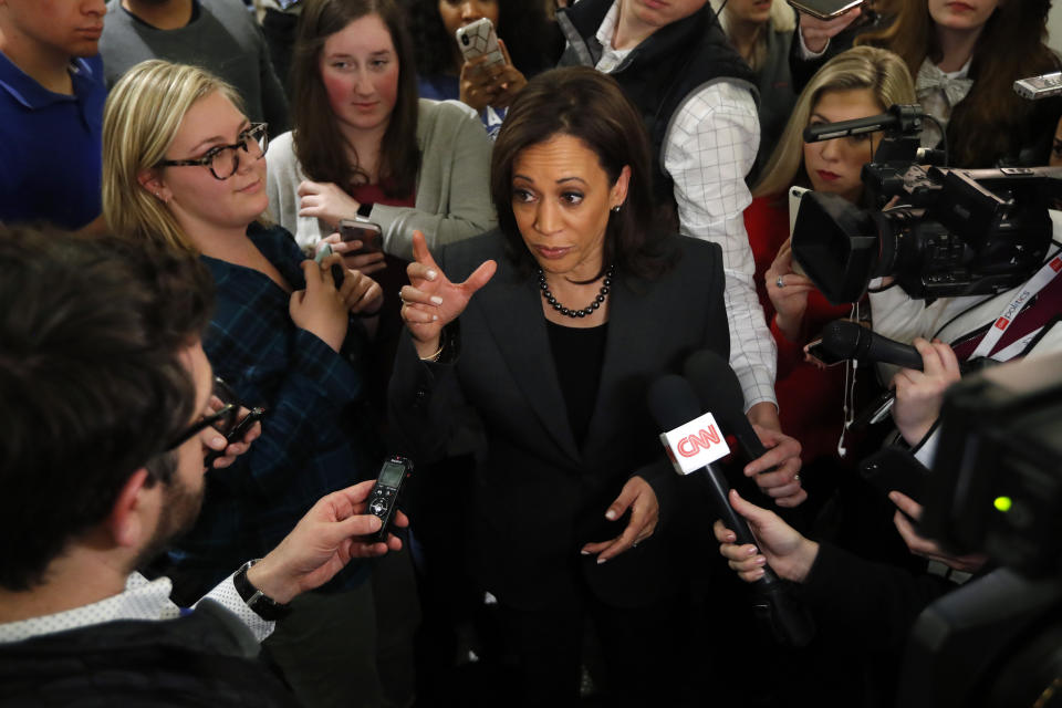 Sen. Kamala Harris, D-Calif., center, speaks to reporters at Drake University, Monday, Jan. 28, 2019, in Des Moines, Iowa. Harris formally announced on Sunday that she was seeking the Democratic presidential nomination. (AP Photo/Charlie Neibergall)