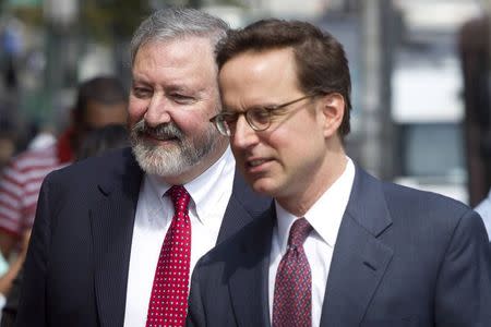 Attorneys Jonathan Blackman (L) and Carmine Boccuzzi, lead lawyers representing Argentina in its ongoing debt talks, arrive at federal court for a hearing in New York August 1, 2014. REUTERS/Carlo Allegri