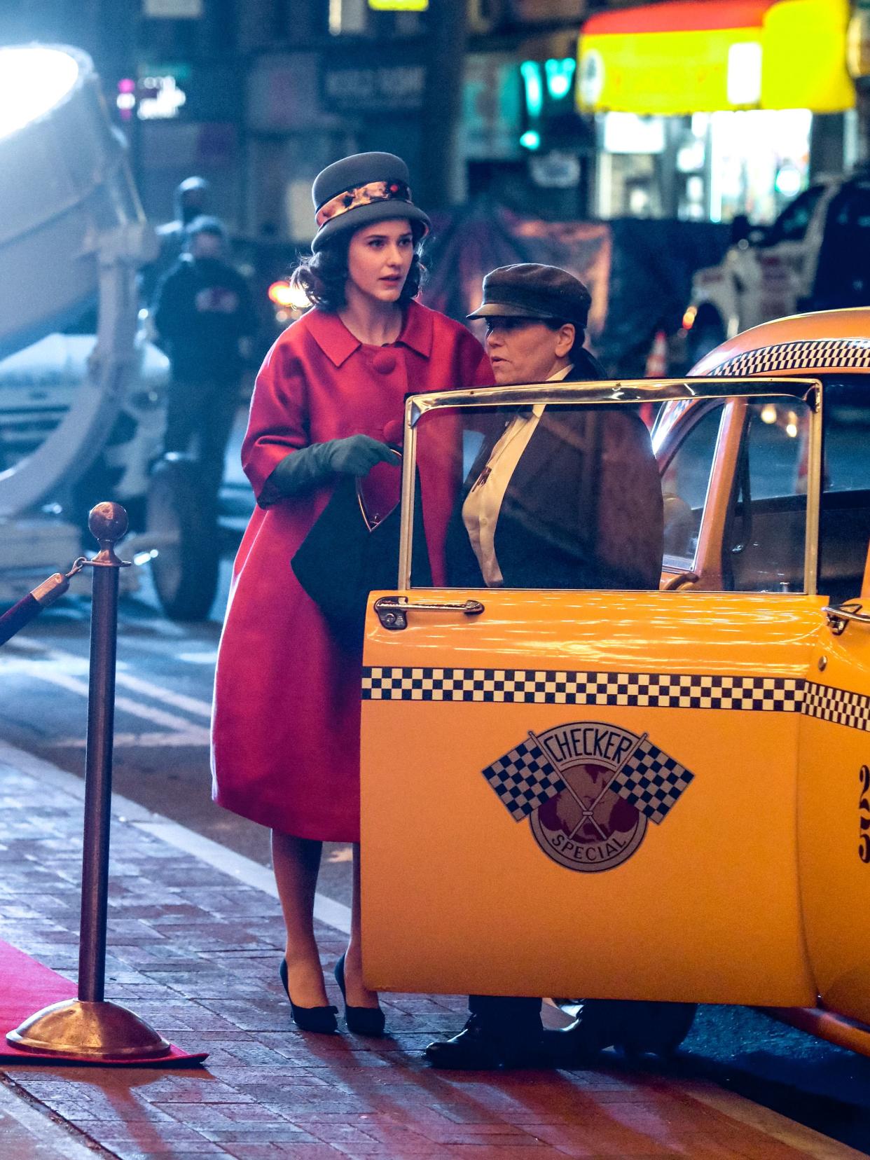 Alex Borstein and Rachel Brosnahan are seen in character filming a scene for "The Marvelous Mrs. Maisel" TV series on April 26, 2021, in New York City.