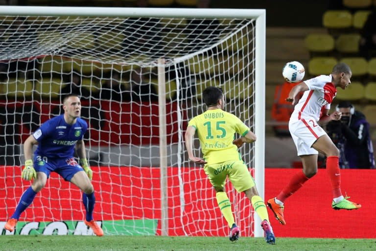 Monaco's French forward Kylian Mbappe Lottin (R) scores a goal during the French L1 football match Monaco (ASM) vs Nantes (FCN) on March 5, 2017 at the "Louis II Stadium" in Monaco