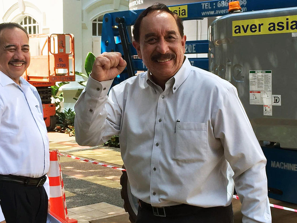 Farid Khan, chairman of Bourbon Offshore Asia Pacific, arrives at the Elections Department on Thursday (24 August) to submit his application forms for the Presidential Election. (PHOTO: Gabriel Choo / Yahoo News Singapore)