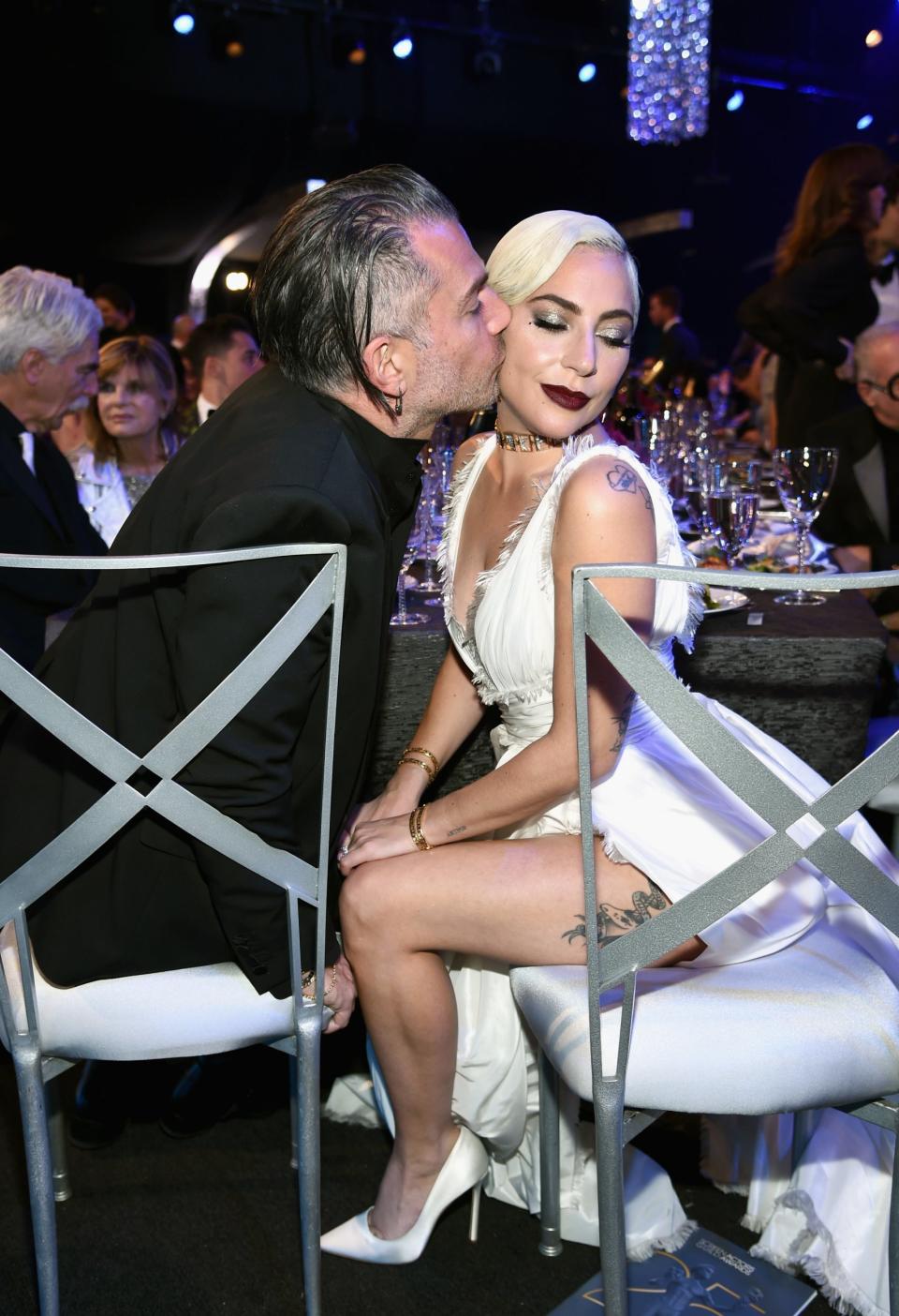 Loved up: Lady Gaga and Chritisna Carino at the SAG awards last month (Getty Images)