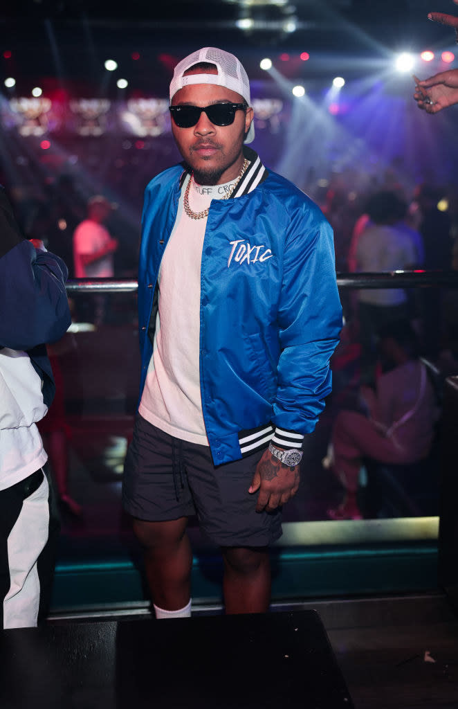 Bow Wow in a Toxic bomber jacket and knee-length shorts