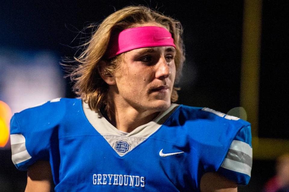 Ocean Springs quarterback Bray Hubbard tears up after losing a close game to Oak Grove ending Ocean Springs’ playoff run at Greyhound Stadium in Ocean Springs on Friday, Nov. 19, 2021.