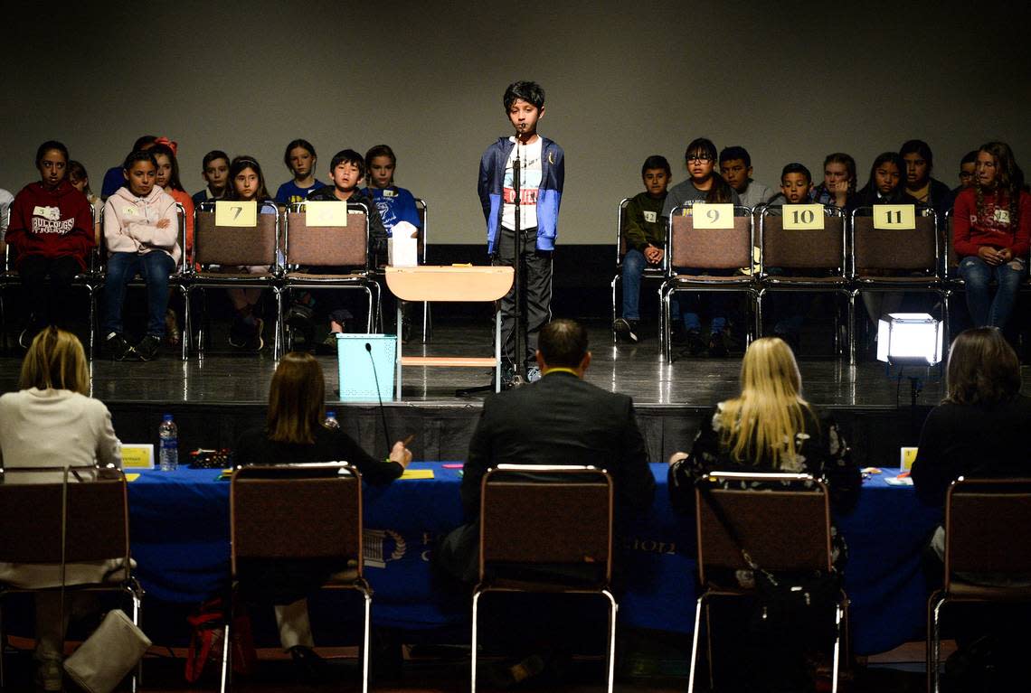 Fugman Elementary School student Achuth Vinay, brother of former National Spelling Bee winner Ananya Vinay, spells a word for judges during the preliminary round for elementary schools at the 25th annual Fresno County Spell Off at the Fresno State Satellite Student Union on Tuesday, March 19, 2019.
