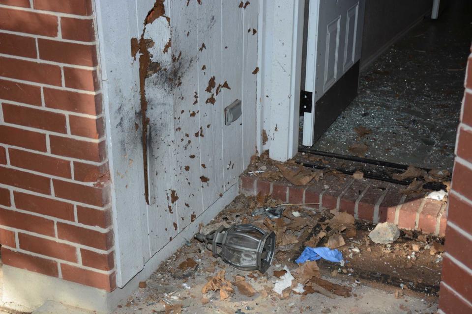 Anthony Stephan House, a 39-year-old father of an 8-year-old daughter, was killed when a package he picked up on his front porch exploded. The foyer near his front door was in shambles.  / Credit: FBI