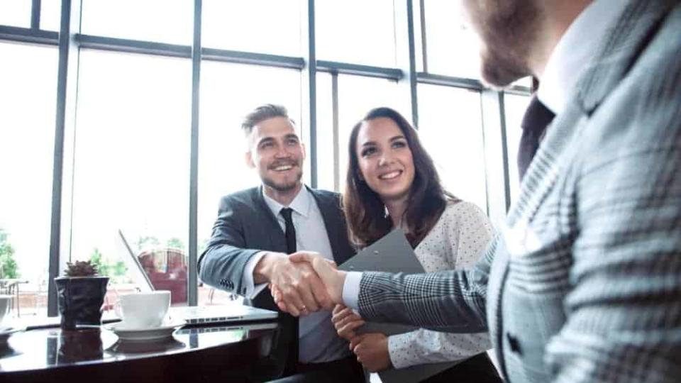 Business people shaking hands