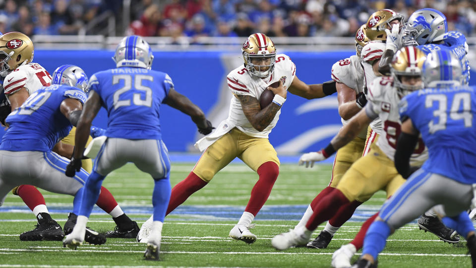 San Francisco 49ers quarterback Trey Lance (5) runs the ball against the Detroit Lions in the second half of an NFL football game in Detroit, Sunday, Sept. 12, 2021. (AP Photo/Lon Horwedel)