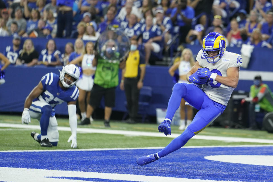 Los Angeles Rams' Cooper Kupp (10) makes a touchdown reception during the first half of an NFL football game against the Indianapolis Colts, Sunday, Sept. 19, 2021, in Indianapolis. (AP Photo/Michael Conroy)