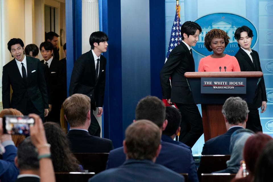 Members of the K-pop supergroup BTS arrive to join White House press secretary Karine Jean-Pierre during the daily briefing at the White House, Tuesday, May 31, 2022, in Washington. 