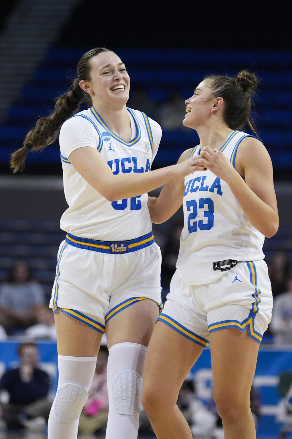 UCLA forward Angela Dugalic (32) celebrates after scoring with forward Gabriela Jaquez (23) during the second half of a second-round college basketball game against Creighton in the women's NCAA Tournament Monday, March 25, 2024, in Los Angeles. (AP Photo/Marcio Jose Sanchez)