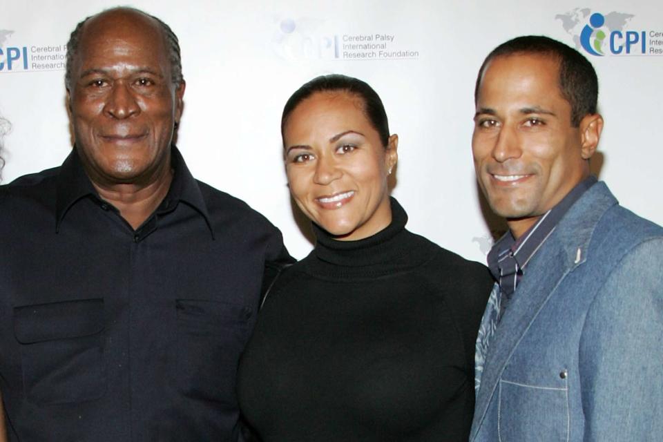 <p>Brian To/FilmMagic</p> John Amos with his children, Shannon Amos and K.C. Amos, at the 1st Annual "A Celebration of Heroes" Power Heroes Gala on December 3, 2008 in Los Angeles, California.