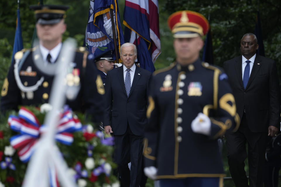 President Joe Biden and Defense Secretary Lloyd Austin arrive at The Tomb of the Unknown Soldier at Arlington National Cemetery in Arlington, Va., on Memorial Day, Monday, May 29, 2023. (AP Photo/Susan Walsh)