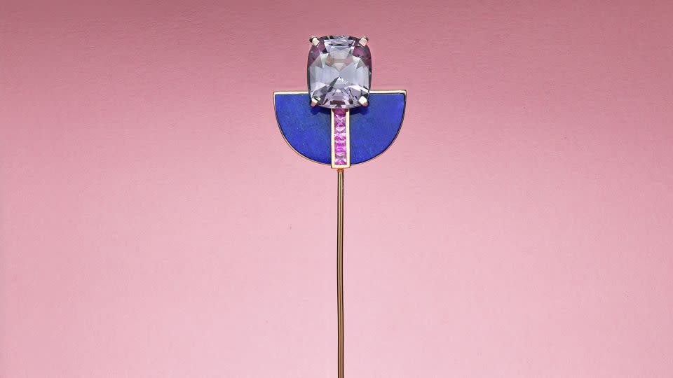 Lily Gabriella's "Memphis Deco Pin," is crafted in 18-carat rose gold and platinum and features a 7.34 carat grey spinel cushion, princess cut pink sapphires and custom cut lapis lazuli (price on application). - Lily Gabriella