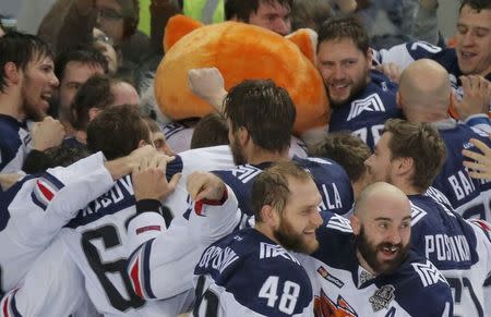 Ice Hockey - CSKA Moscow v Metallurg Magnitogorsk - Kontinental Hockey League - Gagarin Cup Grand Final, Game 7 - Moscow, Russia - 19/04/16 Metallurg Magnitogorsk's players celebrate the victory. REUTERS/Maxim Shemetov