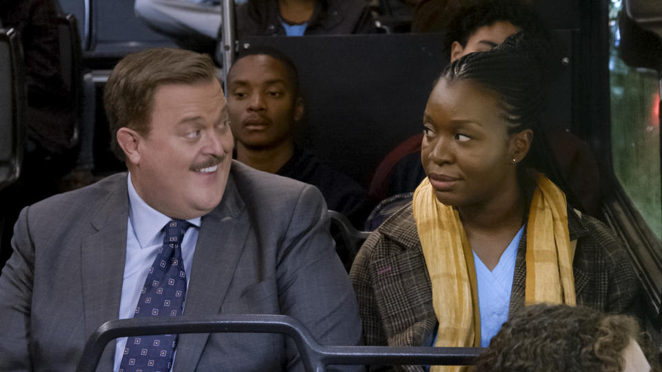 This image released by CBS shows Billy Gardell as Bob, left, and Folake Olowofoyeku as Abishola in a scene from "Bob (Hearts) Abishola," a comedy about a nurse and the former cardiac patient who pursues her. (CBS via AP)