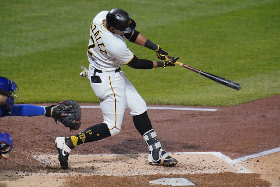 Pittsburgh Pirates' Erik Gonzalez drives in a run with a double off Chicago Cubs starting pitcher Jose Quintana during the second inning of a baseball game in Pittsburgh, Tuesday, Sept. 22, 2020. (AP Photo/Gene J. Puskar)