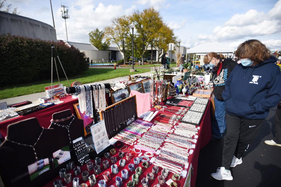 Visitors looks at a jewelry booth during the 2nd annual October Fest in Lodi on October 18, 2020. 