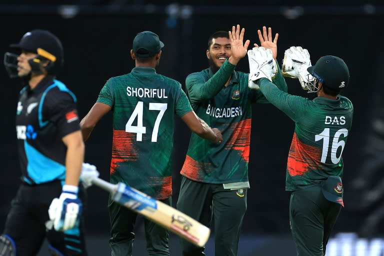 Bangladesh's Rishad Hossain (2nd R) celebrates with teammates Shoriful Islam (2nd L) and wicketkeeper Litton Das (R) to dismiss <a class="link " href="https://sports.yahoo.com/soccer/teams/new-zealand-women/" data-i13n="sec:content-canvas;subsec:anchor_text;elm:context_link" data-ylk="slk:New Zealand;sec:content-canvas;subsec:anchor_text;elm:context_link;itc:0">New Zealand</a>'s Mark Chapman (L) in Napier (Marty MELVILLE)