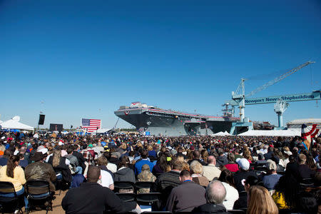 FILE PHOTO: Tens of thousands of Navy supporters attend the christening ceremony of the aircraft carrier Gerald R. Ford (CVN 78) at Newport News Shipbuilding in Newport News, Virginia, U.S. November 9, 2013. U.S. Navy/Chief Mass Communication Specialist Peter D. Lawlor/Handout via REUTERS/File Photo