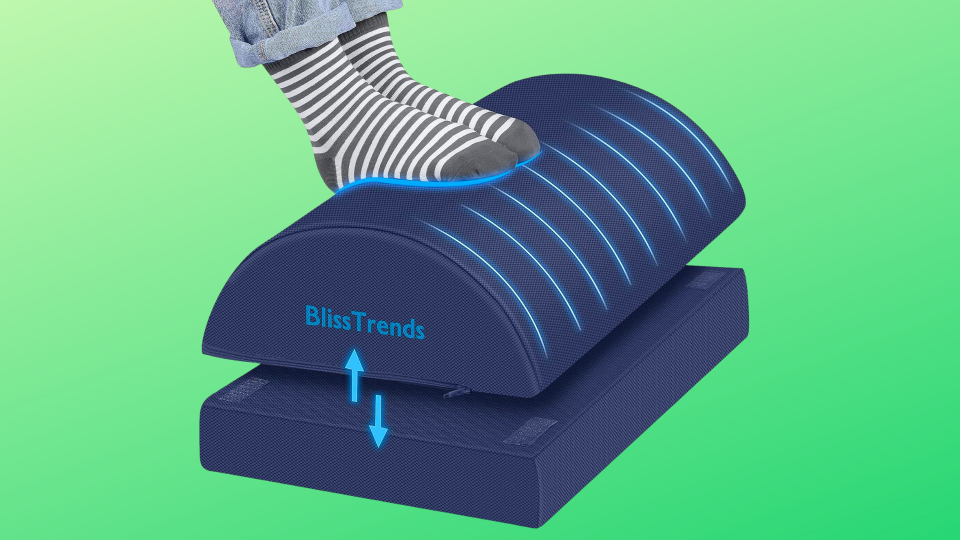 socked feet on a curved BlissTrends footrest