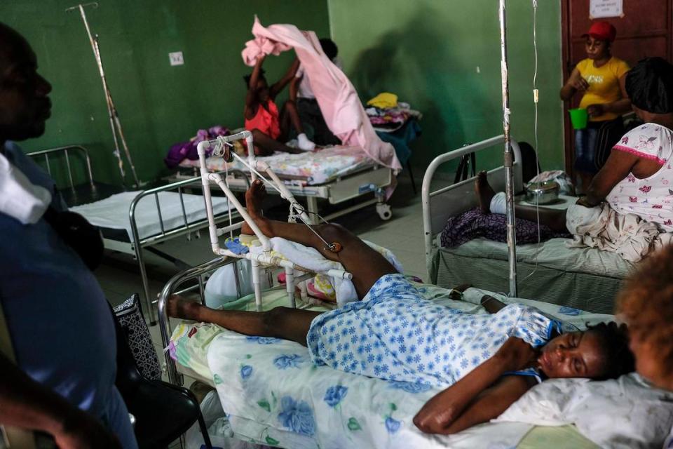 Patients are treated in a shared room at the La Paix Hospital, also known as the University of Peace Hospital, amid severe fuel shortages and a continued general strike in Port-au-Prince, Haiti, Tuesday, Oct. 26, 2021. A bone doctor at the hospital said the facility only has a few more days of fuel to keep operating.