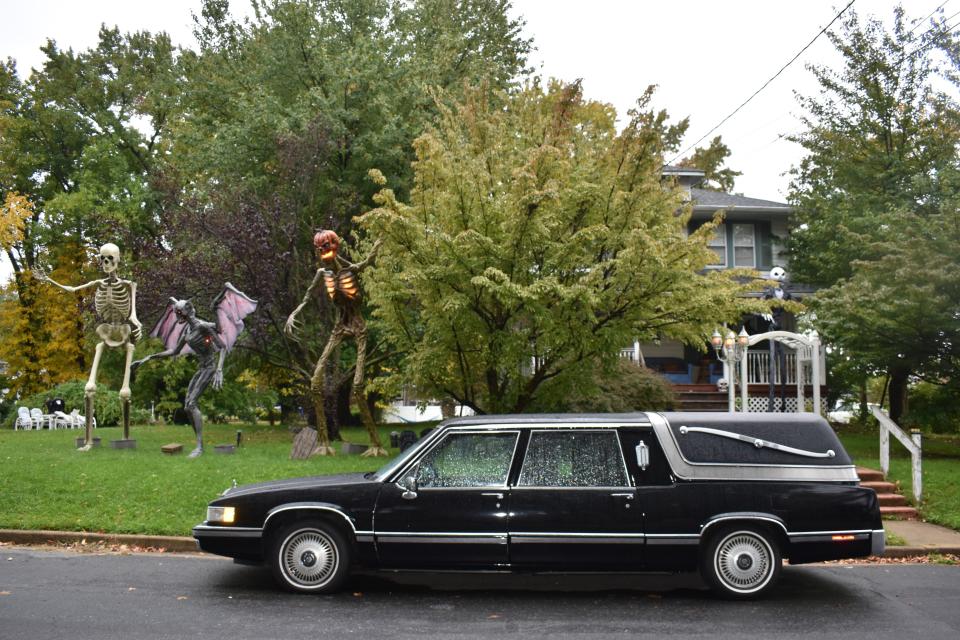 A hearse complements the Halloween decorations outside a home on Graham Avenue in Cherry Hill.