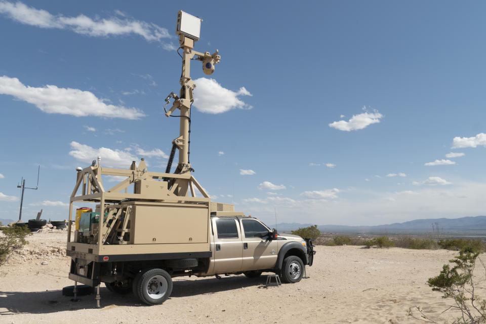 In this April 4, 2019 photo, provided by the U.S. Army, a mobile surveillance camera system is stationed near the Fort Hancock Border Patrol Station at Fort Hancock, Texas. The Trump administration has been quietly adding military surveillance cameras at the U.S.-Mexico border in response to the novel coronavirus pandemic despite the fact fewer people appear to be crossing illegally. Documents obtained by The Associated Press show the Department of Defense at the request of the Department of Homeland Security sent 60 mobile surveillance cameras in addition to 540 more troops to the southwest border this month. (Sgt. Brandon Banzhaf/U.S. Army via AP)