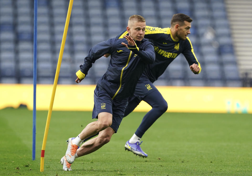 Ukraine's Oleksandr Zinchenko takes part in a training session, at Hampden Park, in Glasgow, Scotland, Tuesday May 31, 2022. Scotland will play Ukraine in a World Cup qualifier soccer match on Wednesday. (Andrew Milligan/PA via AP)