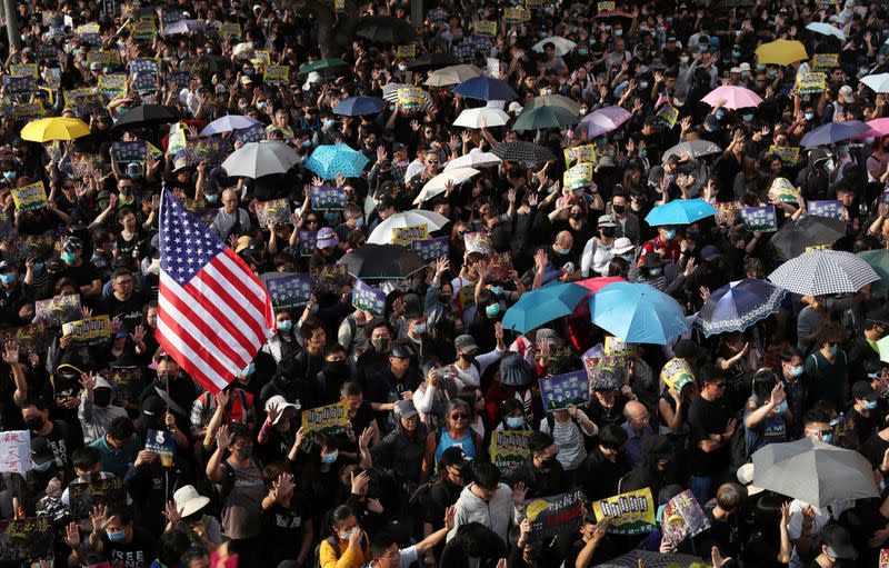 Anti-government protesters attend the "Lest We Forget" rally in Hong Kong