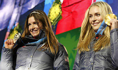 Julia Mancuso, left, wears her tiara, while showing off her silver medal while teammate Lindsey Vonn displays her gold