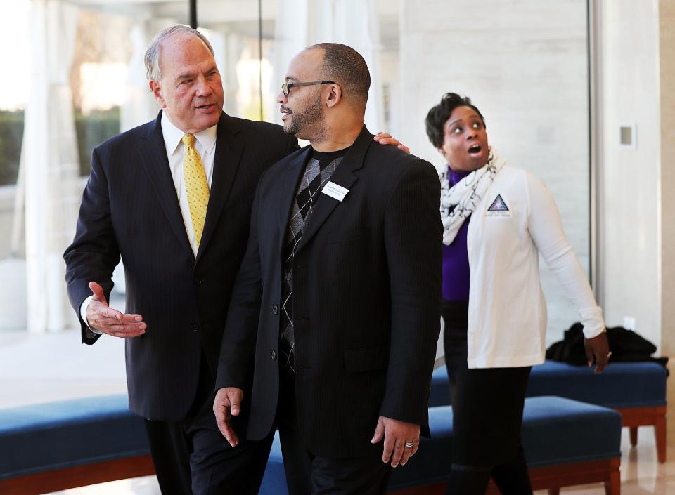 Elder Ronald A. Rasband, left, of the Quorum of the Twelve Apostles of The Church of Jesus Christ of Latter-day Saints, talks with Pastor Chris Zacharias of the John Wesley A.M.E. Zion Church as they tour the Rome Temple Visitors’ Center on Tuesday, Jan. 15, 2019. Behind them, Pastor Zacharias’ wife, Kim, looks at the Christus statue. | Ravell Call, Deseret News