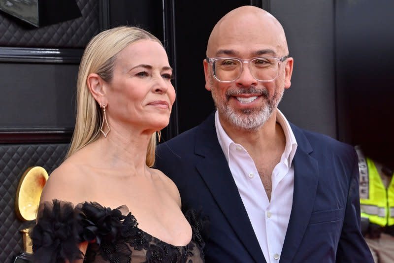 Jo Koy, seen with Chelsea Handler, will host the Golden Globe Awards in January. File Photo by Jim Ruymen/UPI