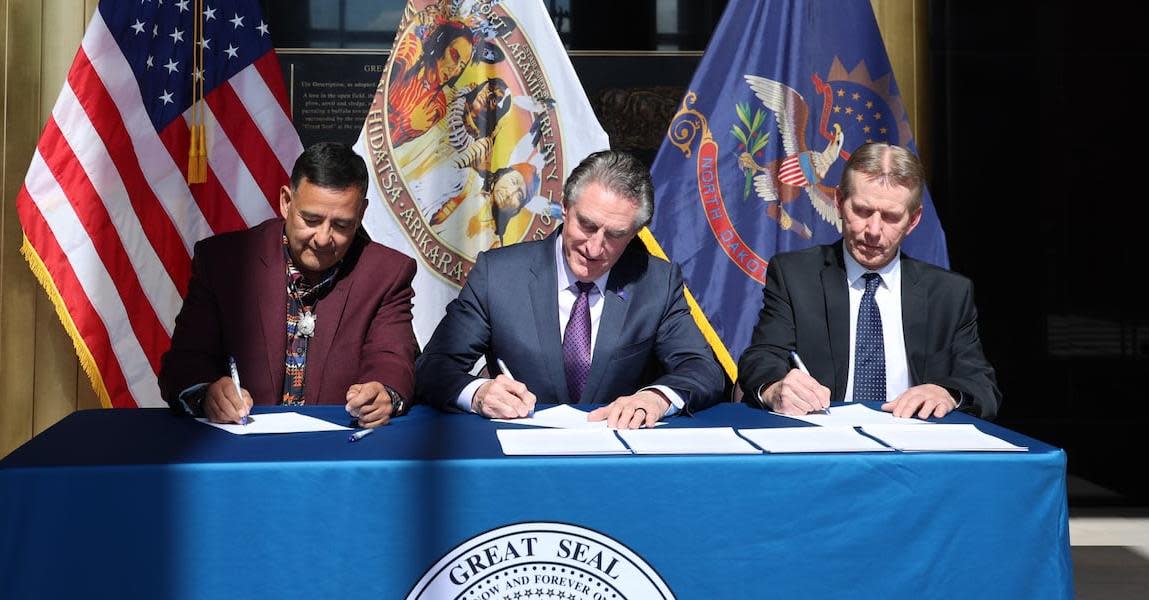 Mandan, Hidatsa and Arikara (MHA) Nation Chairman Mark Fox, North Dakota Gov. Doug Burgum, and State Tax Commissioner Brian Kroshus on Friday signed a historic alcohol tax revenue sharing agreement. (Photo/Facebook)