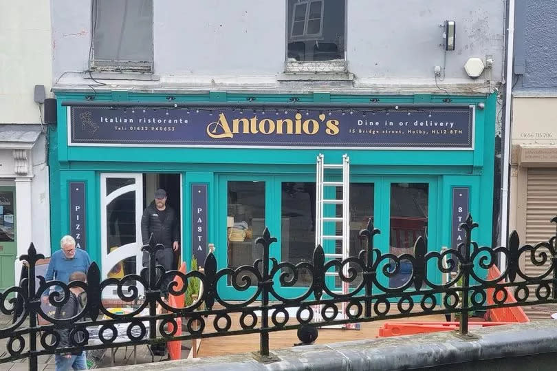 Building in Dunraven Place, Bridgend where BBC's Casualty have used to film an episode of the hit drama series with the finished fake sign reading from left to right; Italian ristorante, Antonio's, Dine in or delivery with a fake telephone number and address. The address says that the restaurant is located in Holby.