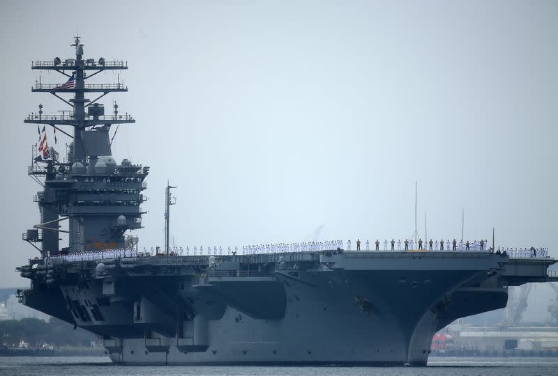FILE PHOTO: Aircraft carrier USS Nimitz departs San Diego with Carrier Strike Group 11 and some 7,500 sailors and airmen for a 6 month deployment in the Western Pacific