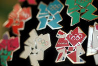 London 2012 pin badges go on display at the launch of the London Olympic Games official merchandise on July 30, 2010 in London, England. (Photo by Oli Scarff/Getty Images)