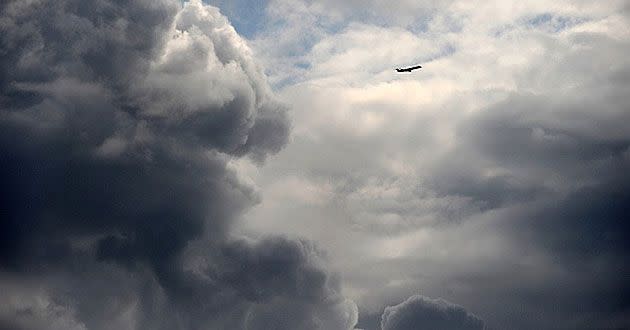 An airplane emerges from a storm at the Toulouse-Blagnac airport. Source: Getty