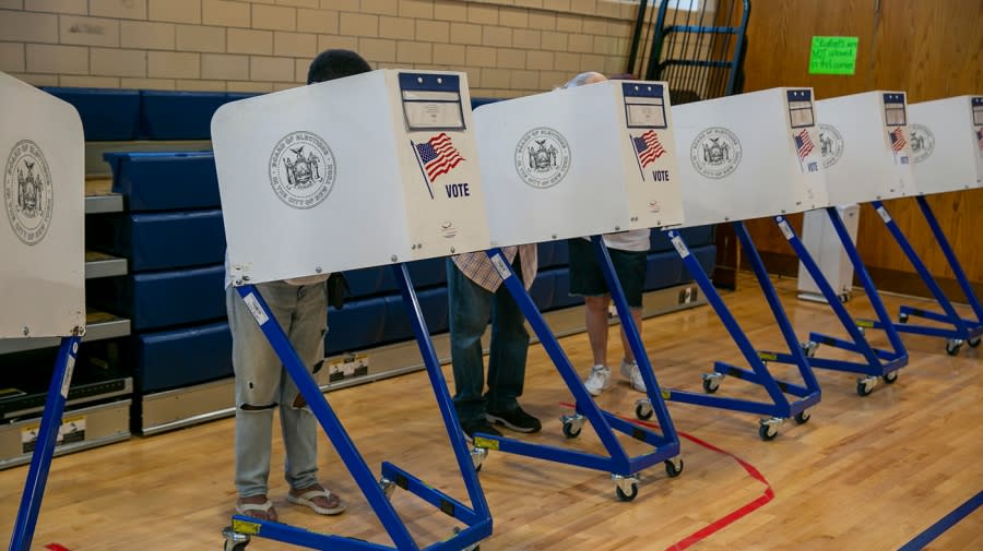People vote at the Anning S. Prall Intermediate School in the Staten Island borough of New York City on Tuesday, June 28, 2022.