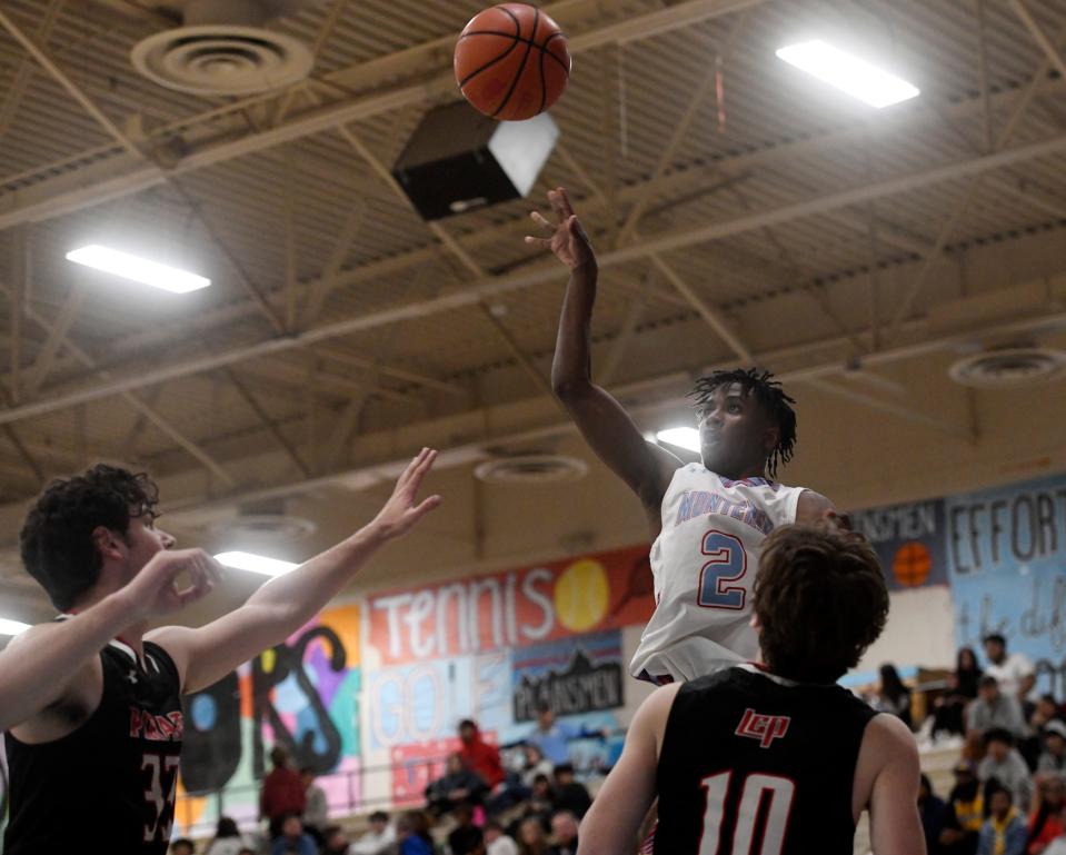 Monterey's Zyrin Brantley shoots the ball against Lubbock-Cooper in a District 4-5A basketball game, Friday, Jan. 20, 2023, at New Box at Monterey High School.