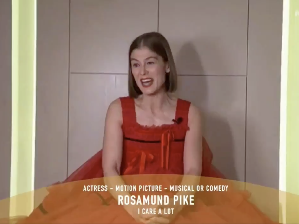 Rosamund Pike collects her Best Actress award at the Golden Globes (NBC)