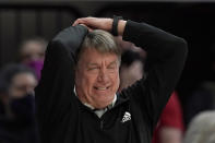 North Carolina State head coach Wes Moore reacts during the first half of an NCAA college basketball game against Louisville in Raleigh, N.C., Thursday, Jan. 20, 2022. (AP Photo/Gerry Broome)