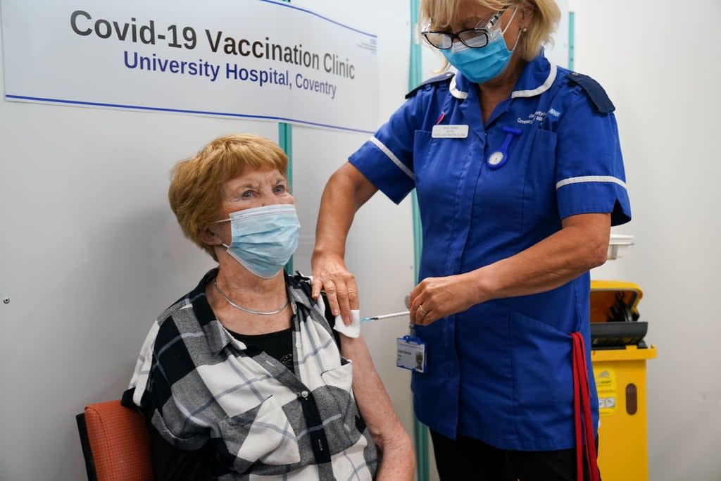 Margaret Keenan, the first person to receive the coronavirus vaccine in December last year, receives her booster jab at University Hospital Coventry, Warwickshire (Jacob King/PA) (PA Wire)