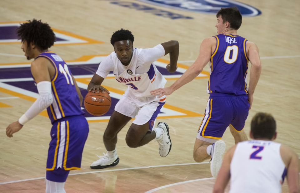 Evansville’s Jawaun Newton (3) drives the lane as the University of Evansville Purple Aces take on the University of Northern Iowa Panthers at Ford Center in Evansville, Ind., Wednesday evening, Jan. 26, 2022. 