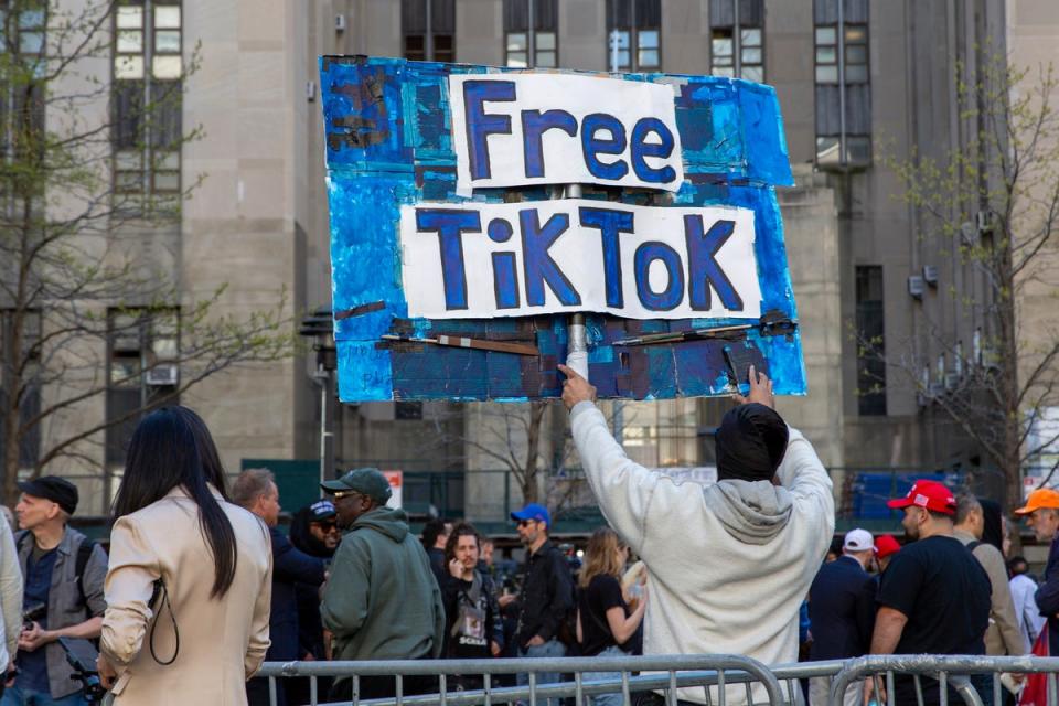 TikTok supporters protest at the hush-money trial of Donald Trump in New York in April (Associated Press)